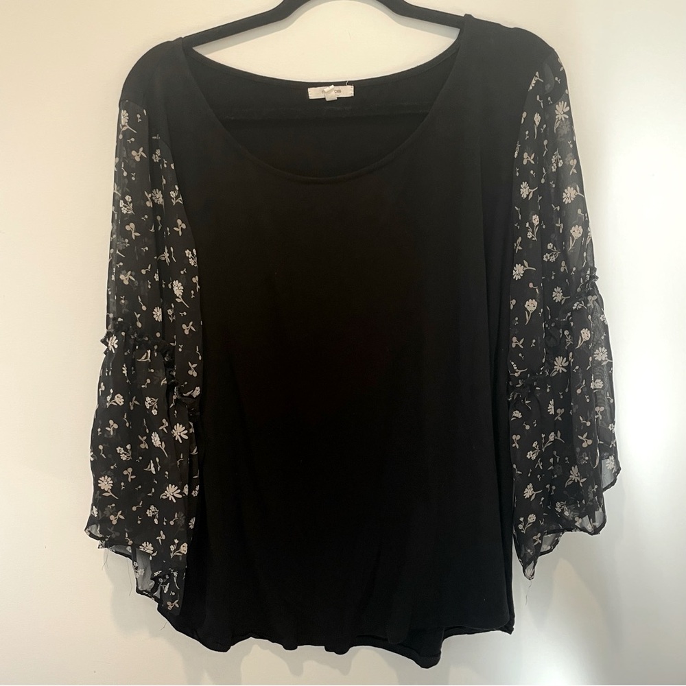 Maurice’s women’s black blouse with see through floral ruffle sleeves